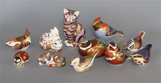 A collection of Royal Crown Derby Imari paperweights,